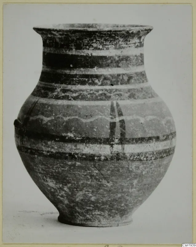 Painted pottery jar with a flaring rim and horizontal bands of dark and light decoration