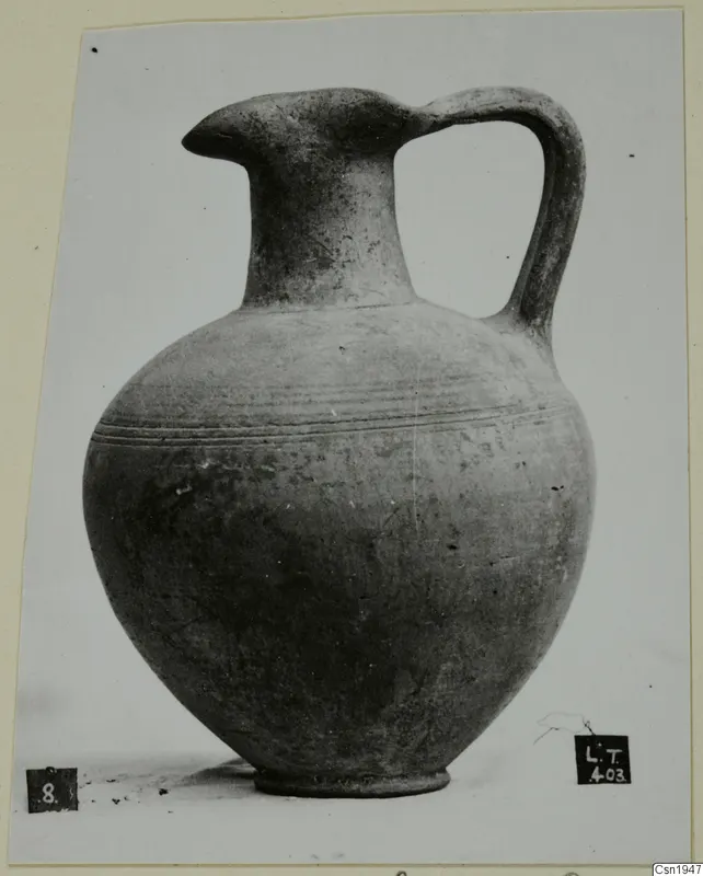 Pottery jug from Lapithos with a beaked spout and strap handle