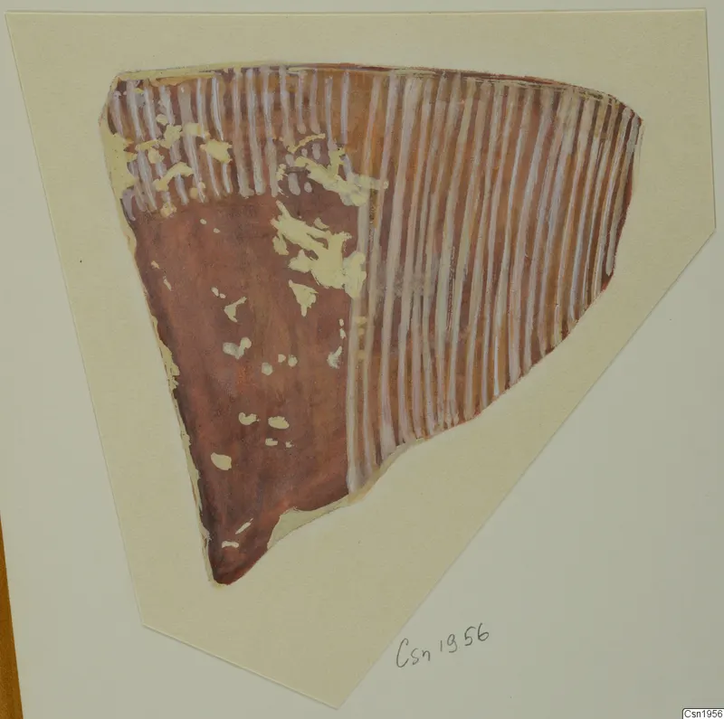 Pottery sherd with a reddish-brown surface and white vertical stripes, shown on a cream card mount