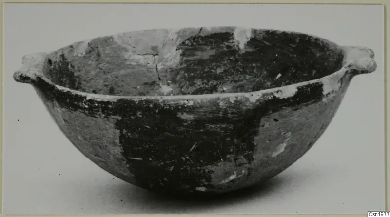 Pottery Reserved Ware bowl from Vounous with two small handles and dark painted bands