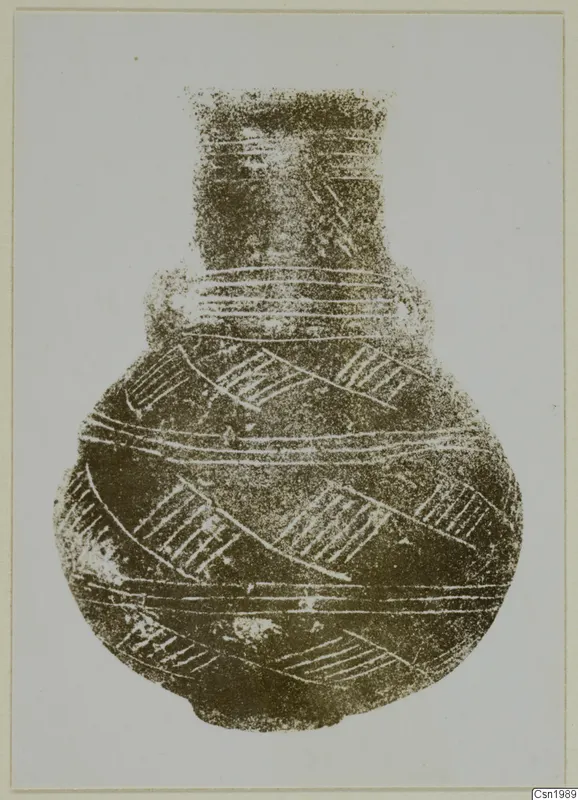 Pottery Red Polished III amphora with a tall neck, rounded body and pale banded and hatched decoration, shown against a grey background.