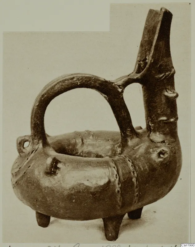 Red Polished III pottery amphora from Vounous, with a tall spout, strap handle and three feet, photographed against a plain background