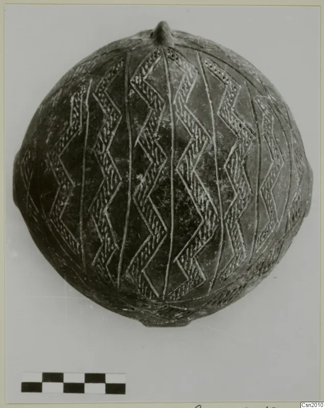 Pottery Red Polished II Bowl, a rounded vessel with incised zigzag bands and vertical lines