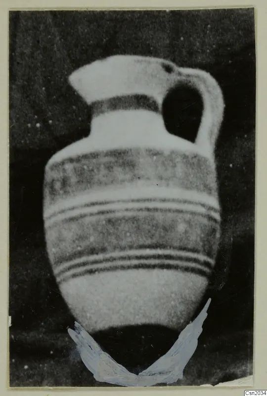 Pottery vessel, White Painted I amphora from the Kastros tombs at Lapithos, photographed against a dark background