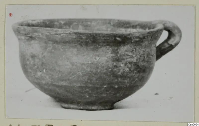 Pottery cup with one handle from Marion, shown in side view