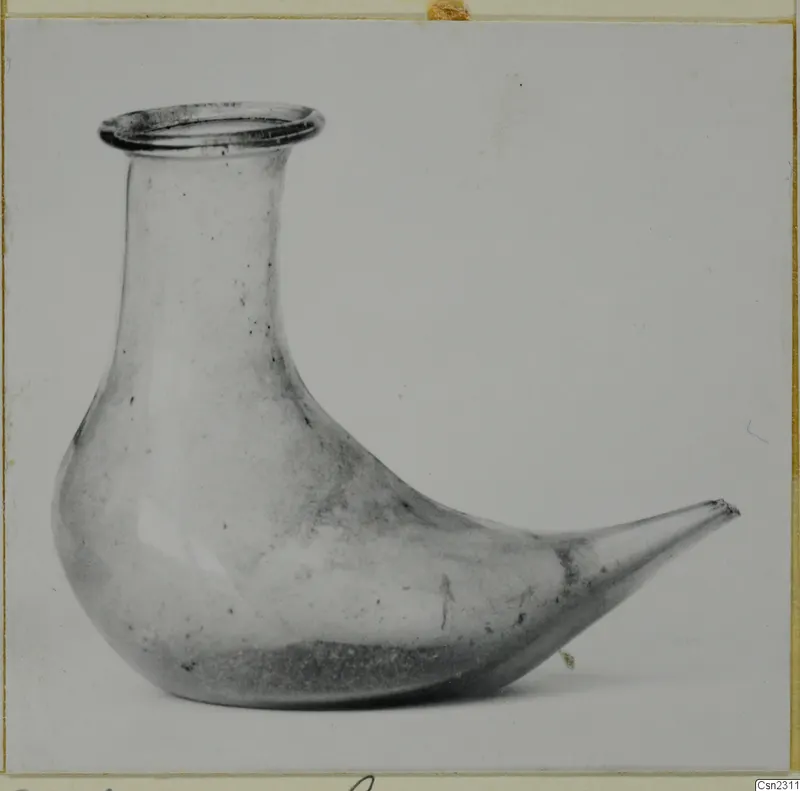 Blown glass container with a bird-shaped body, shown in side view against a plain background