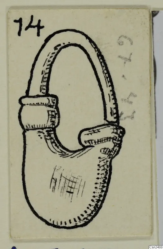Ink drawing of a silver object: a large open loop joined to a broad, flattened lower part, from the Marion tomb finds.