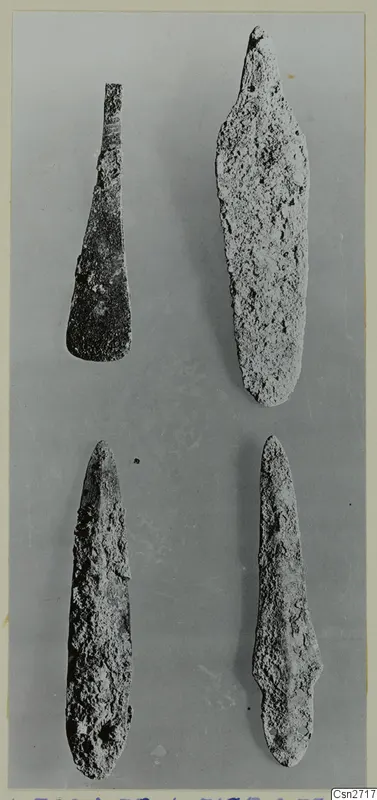 Four corroded bronze tools from Amathus, laid out in two columns