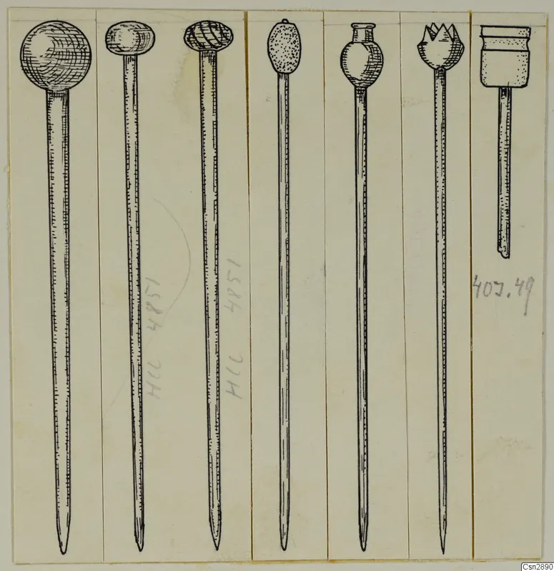 Drawing of several long pins with differently shaped heads, each in its own narrow vertical strip.