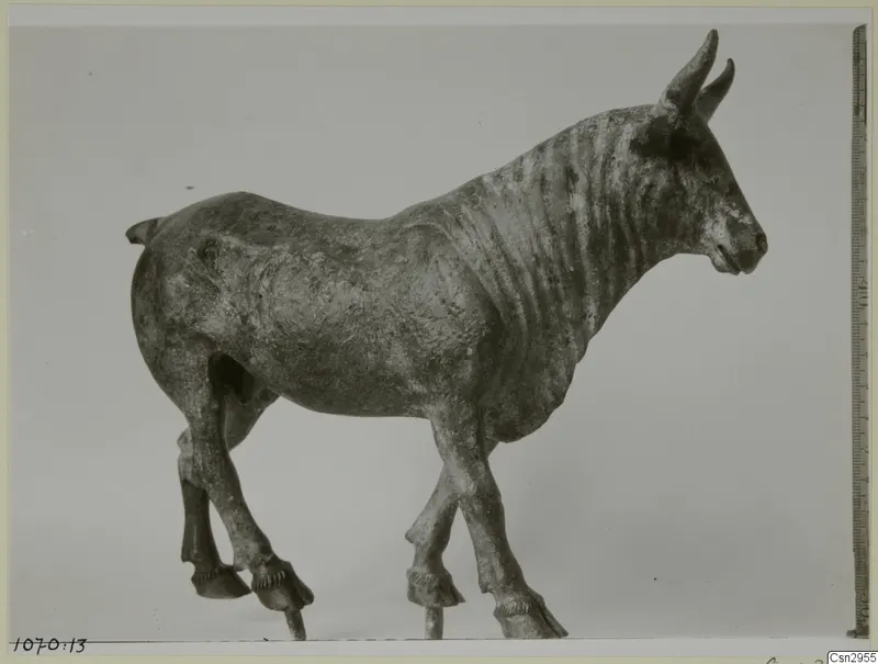 Animal figurine with curved horns, photographed after conservation