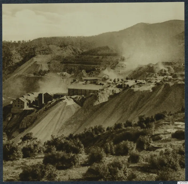 Mining complex with sheds, buildings and spoil slopes on hillsides, the Amiandos asbestos mine