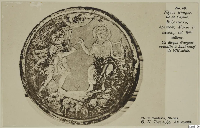 Round silver disc with raised relief figures and animals, photographed on a printed card mount