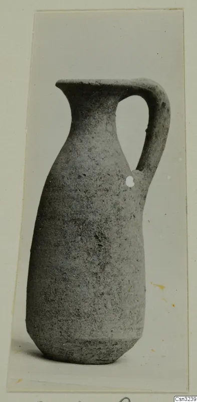 Pottery Plain White VI, a handled jug with a tall narrow neck, photographed against a plain background