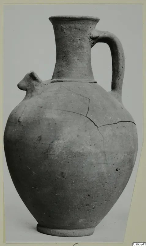 Plain pottery jug with a beak-shaped spout, strap handle and ring base, Pottery Plain White VI