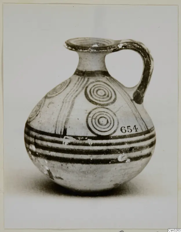 Pottery White Painted V: jug with a strap handle, concentric-circle motifs and dark horizontal bands