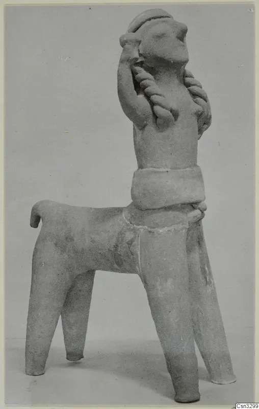 Terracotta figurine with a four-legged animal body and a human-like upper body, one arm raised to the head.