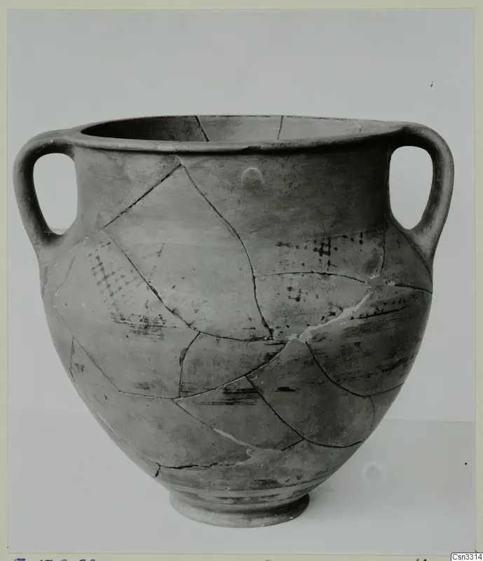 Two-handled pottery amphora-crater from Enkomi with a dark surface and mended cracks