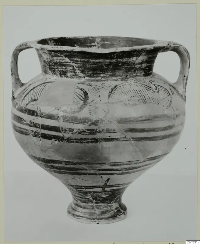 Two-handled painted pottery amphora-crater from Enkomi, with dark horizontal bands and arc motifs on the shoulder