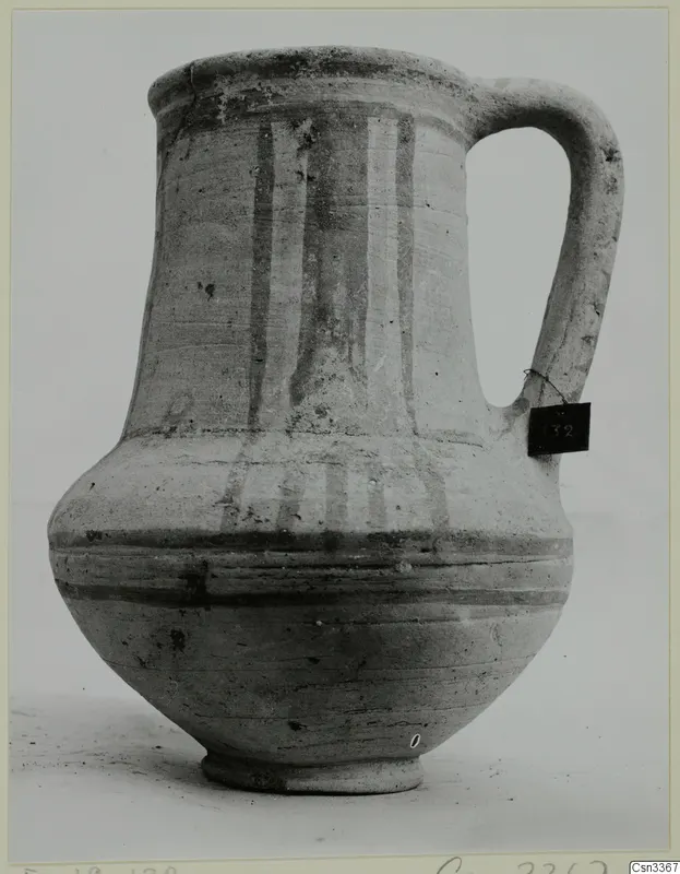 Pottery Bichrome Wheel-made jug from Enkomi, with dark painted bands on a pale body