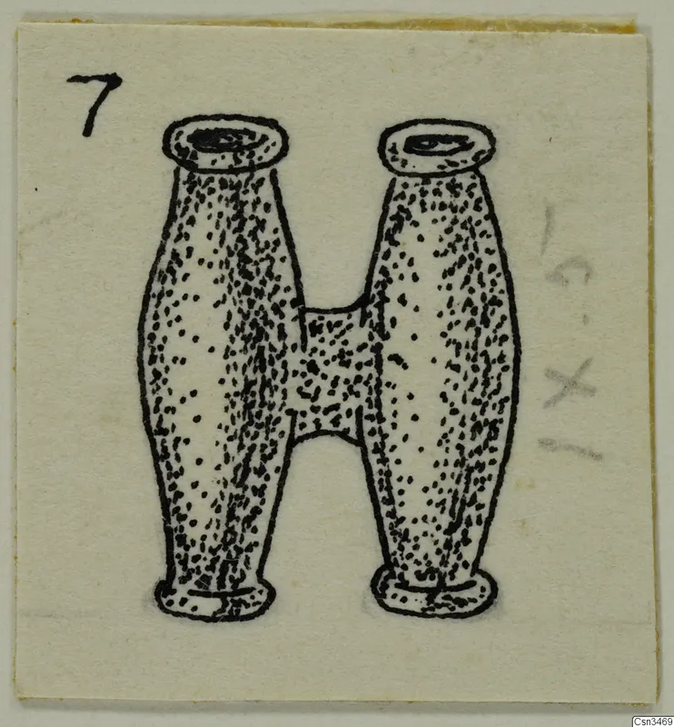Ink drawing of an H-shaped object with two barrel-shaped ends and rimmed openings, on a card marked 7.