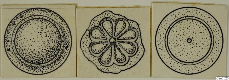 Drawing of three round gold jewellery pieces, the middle one with an eight-petalled rosette pattern