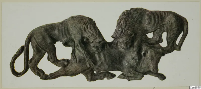 Bronze openwork plaque showing two lions attacking a third animal beneath them