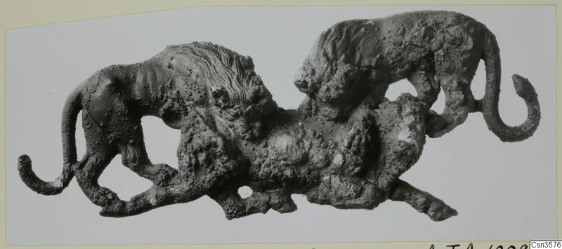 Bronze openwork sculpture of two lions attacking a bull