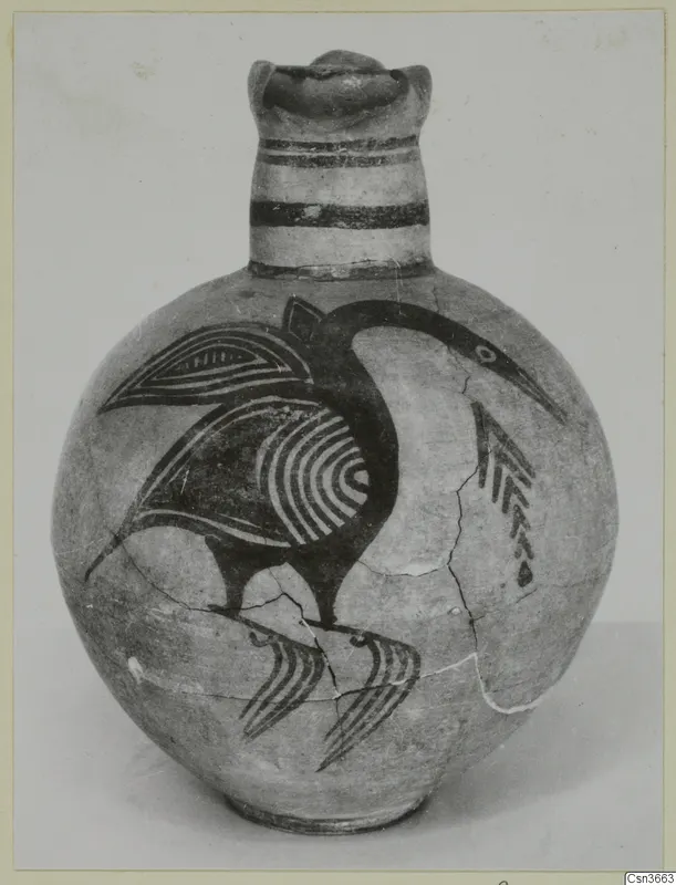 Pottery Bichrome IV jug with a painted bird, photographed against a plain background