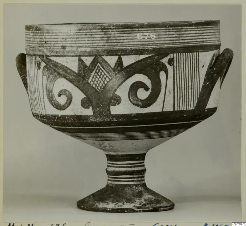 Pottery Bichrome IV footed bowl with two side handles and dark painted spirals and bands