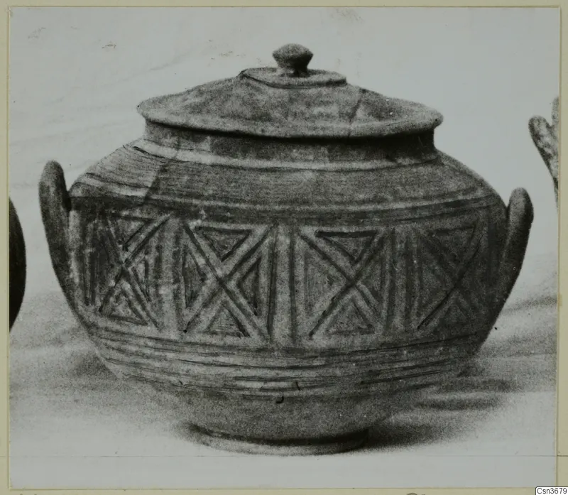 Pottery vessel with a domed lid, two side handles and a band of triangular patterns