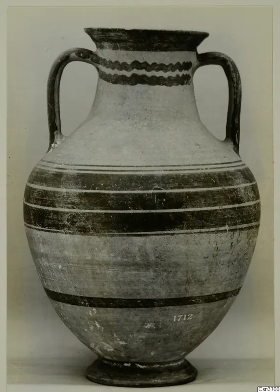 Two-handled jar with a flared rim, wavy painted bands on the neck and dark horizontal bands on the body