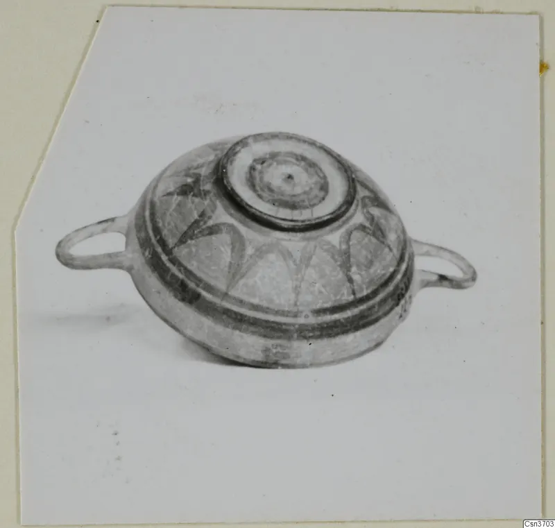 Two-handled vessel with a flat central top disc and dark painted bands and curving motifs on its body
