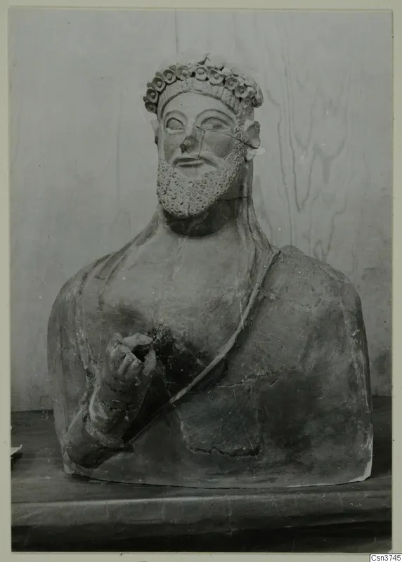 Bust of a bearded man with a wreath on his head and one hand raised to the chest, from Mersinaki