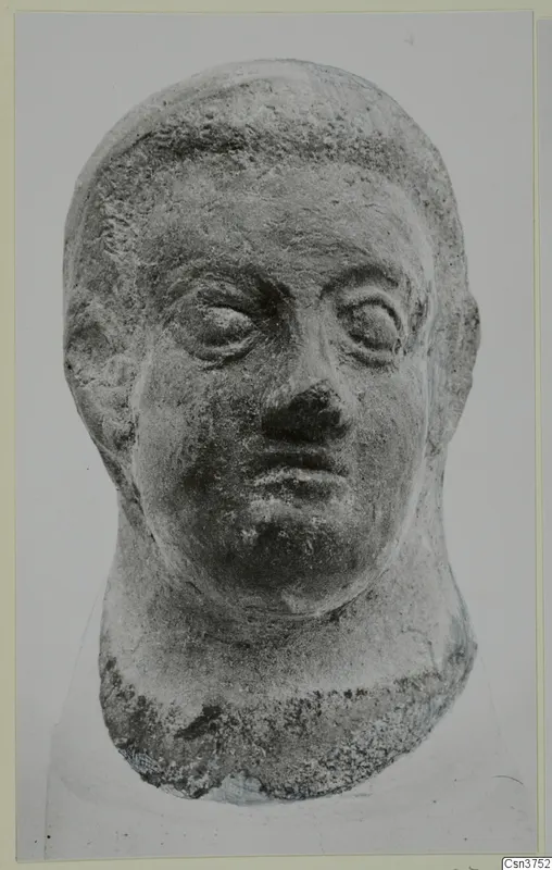 Head sculpture from Mersinaki, shown frontally with wide eyes, a broad nose and a short hairline