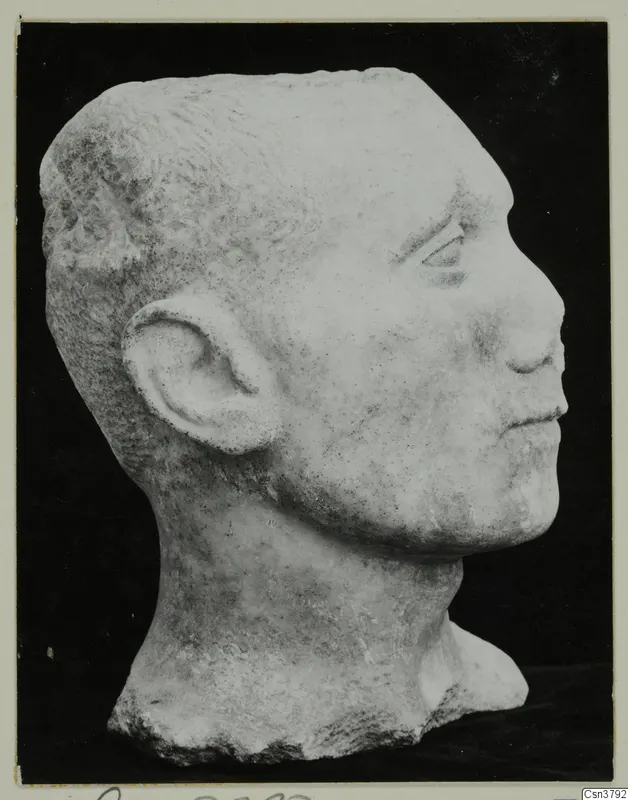 Roman sculpture: carved stone head of a man in profile, facing right