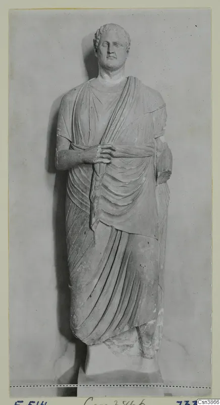 Standing draped stone statue of a male figure, from the Hellenistic and Roman sculpture series.