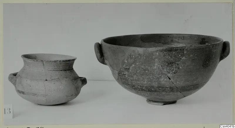 Two pottery vessels from Amathus: a small two-handled jar and a larger deep bowl with handles
