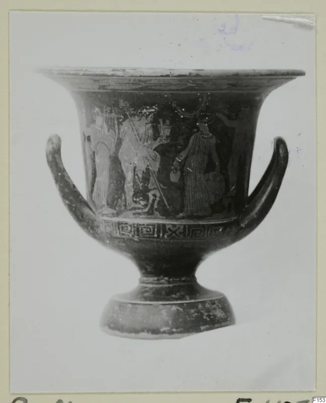 Painted pottery vessel with figures in a band above a key pattern