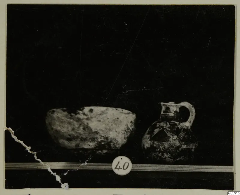 Bowl and painted juglet on a ledge, from Lapithos Markides T. 40