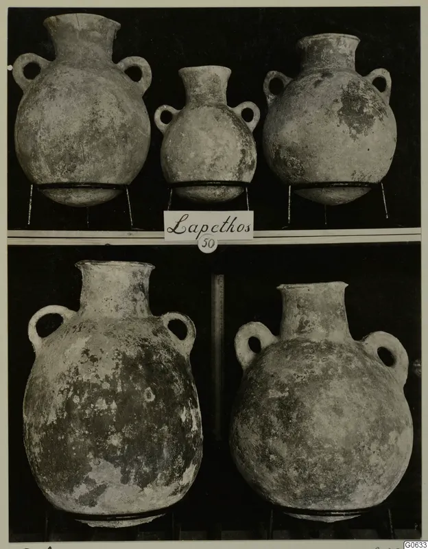 Five two-handled jugs with rounded bodies and long necks, shown in two rows, from Lapithos Markides Tomb 50.