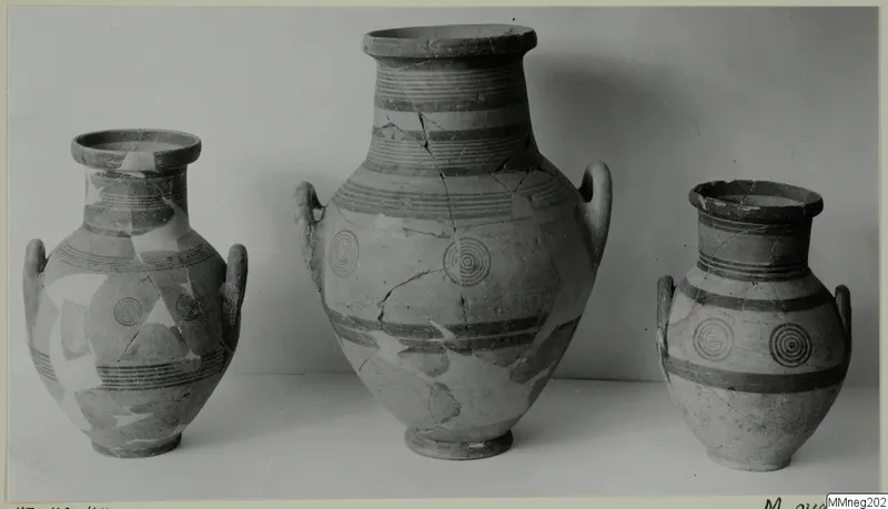 Three painted two-handled jars from Marion, shown side by side against a plain background