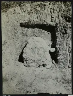 Tomb 314 at Lapithos, Vrysi Tou Barba, with a large stone lying in the chamber opening during excavation.