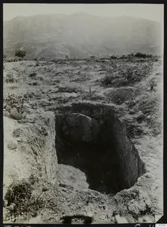 Tomb 305 at Lapithos, Vrysi tou Barba, during excavation, with a large boulder lying in the tomb chamber
