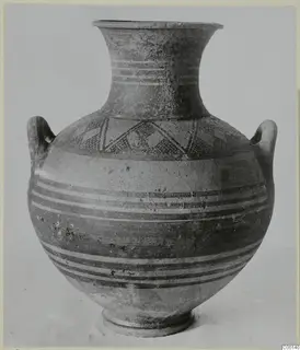 Pottery White Painted I amphora with two loop handles, horizontal bands and angular painted motifs on the shoulder