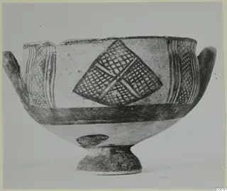 White Painted I bowl from Lapithos, with cross-hatched lozenge and vertical bands painted in dark on a light ground