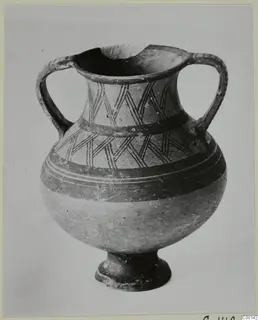 Two-handled White Painted I amphora from Lapithos, with lattice-painted neck and bands on a pale body