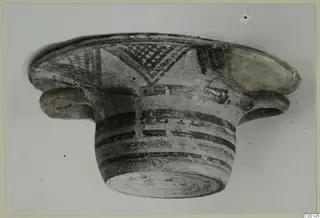 Pottery Bichrome I bowl from the Kastros tombs at Lapithos, seen from the side with painted bands and patterned rim