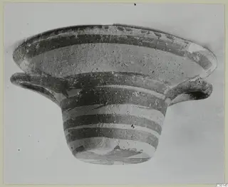 Pottery White Painted I bowl from Lapithos, with dark painted bands on a pale clay body