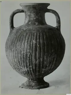 Two-handled amphora of Black Slip Ware with a ribbed body and ring foot