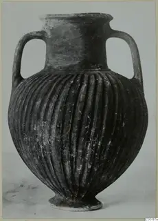 Black slip ware amphora with two handles and vertical fluting, from the Kastros tombs at Lapithos